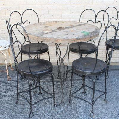 Antique Wrought Iron Ice Cream  Parlor Chairs (6) and an Antique Wrought Iron Ice Cream  Parlor Table w/Wood Top