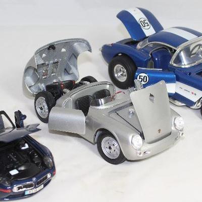Open View:   Maisto  BMW Z8 1/24 Scale Model Car;  Maisto Silver Porsche 550A Spyder 1/18 Scale Model; Maisto Blue 1957 Corvette Gasser...