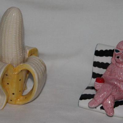 A portion of a Salt and Pepper Shaker Collection:  Peeled Banana Set,  Pink Poodle in Lounge Chair