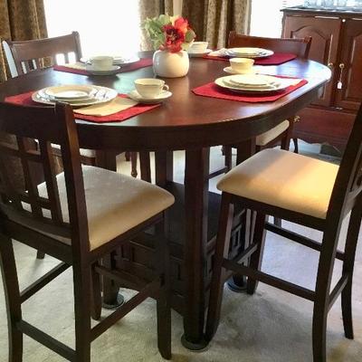 Like new pub drop leaf table with 4 chairs