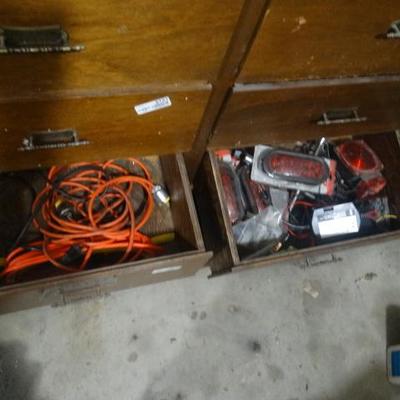 Drawers of extension cords, trailer lights and ele ...