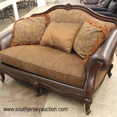  2 Piece Leather and Upholstered Sofa and Loveseat

Auction Estimate $200-$400 â€“ Located Inside 