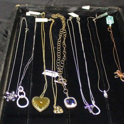  Large Selection of Marked 925 Silver Necklaces, Earrings, and Charms

Auction Estimate $30-$80 â€“ Located Glassware 