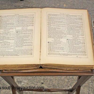  Walnut Bookstand with ANTIQUE Leather Bound Bible

Auction Estimate $100-$200 â€“ Located Inside 