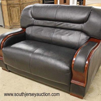  NEW Black Leather with Mahogany Trim Loveseat

Auction Estimate $200-$400 â€“ Located Inside 