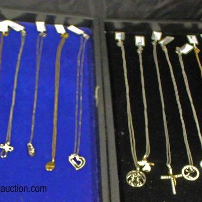  Large Selection of Marked 925 Silver Necklaces, Earrings, and Charms

Auction Estimate $30-$80 â€“ Located Glassware 