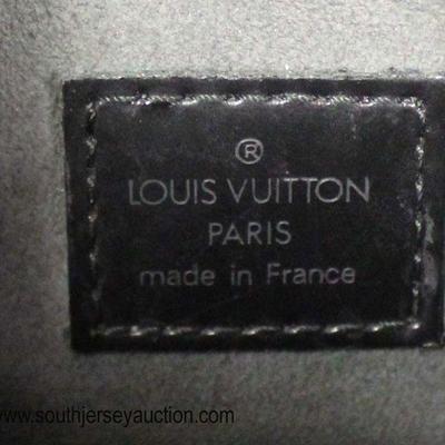  Authentic â€œLouis Vuittonâ€ Black Leather Epi Pint Neuf MI I020 Purse

Auction Estimate $500-$1000 â€“ Located Glassware 