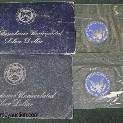  1971 and 1974 Eisenhower Uncirculated Silver Dollar

Auction Estimate $20-$50 each â€“ Located Glassware 