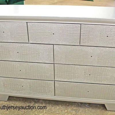  NEW Contemporary Decorated with Faux Snake Skin Front 9 Drawer Low Chest â€“ Hardware in Drawer

Auction Estimate $200-$400 â€“ Located...