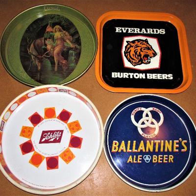 Many vintage drink trays