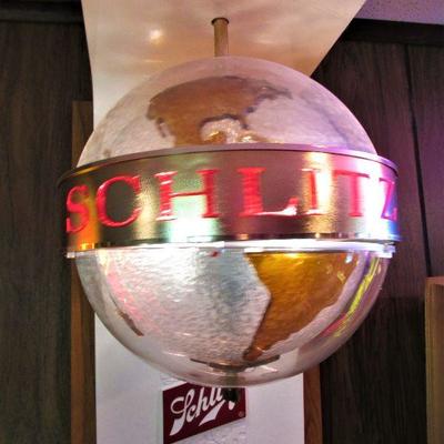 Rotating Schlitz globe light