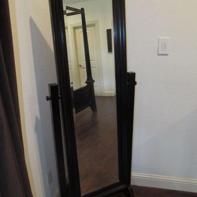 Standing full-size beveled mirror