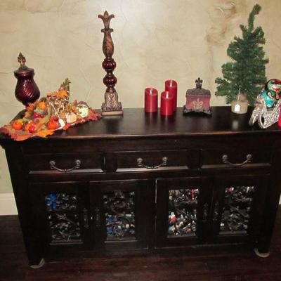 A rustic console w/ decorative metalwork. Perfect for your entertainment system, office, foyer, or dining room!