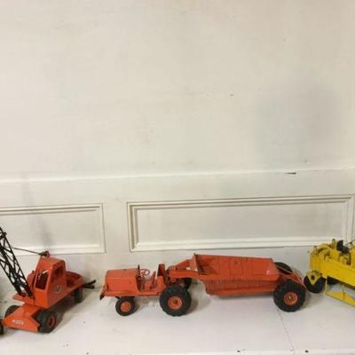 L-R:  Tonka Farms Pressed Steel Truck, Charles Wm. Doepke Model Toys (Unit Crane, Euclid the Pioneer Bottom Dump Big Earthmover), Druge...