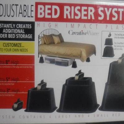 Adjustable bed riser system