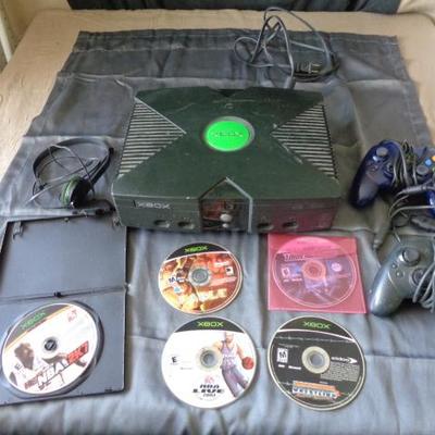 Xbox w 5 games ,Headphones ,and 2 controllers