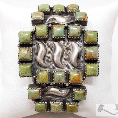 Authentic and Rare Marked Native American Green Turquoise Sterling Silver Cuff Bracelet, 53.9g
Weighs approx 53.9g Measures approx 2.5in...