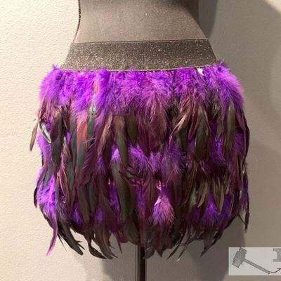 Feathered Cocktail Skirt, XL
This beautiful feathered cocktail skirt is a size XL and it has been worn only a couple times!
Size: Extra...
