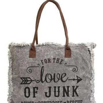 Vintage Addiction Love of Junk Market Tote
- Dual top handles - Snap button magnetic closure - Exterior features graphic print, frayed...