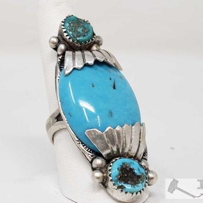 Authentic Old Pawn Native American Turquoise Sterling Silver Ring from the 1970s
This Beautiful ring, its Approx Size is 8.5. Measures...