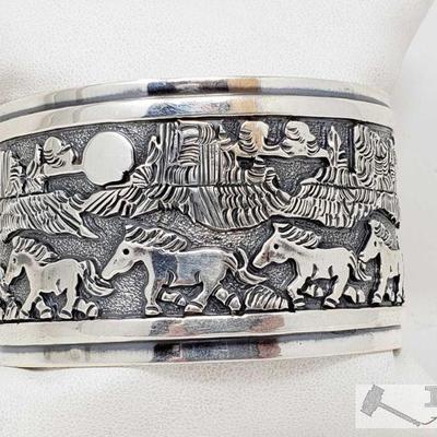 Signed By Artist Native American Story Teller Sterling Silver Cuff Bracelet, 77.0
This beautiful marked sterling silver old pawn cuffed...