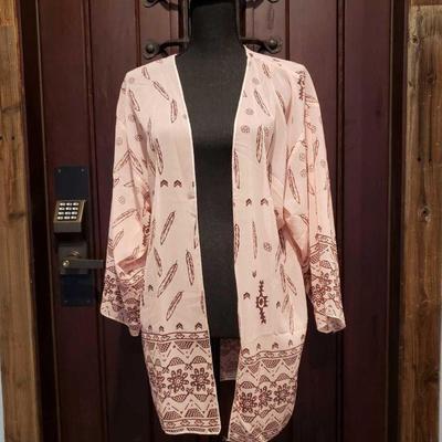 Pink Native American Cardigan,
This Cardigan is pink and has a bull head on the back, along with other beautiful native American designs!...