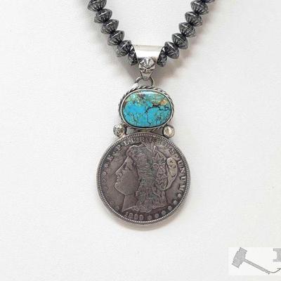 Beautiful Artist Marked Sterling Pendent with a Authentic Morgan Silver Dollar *CHAIN NOT INCLUDED**
Beautiful Artist Marked Sterling...