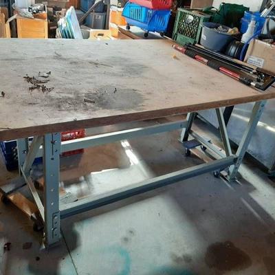 Heavy duty metal base table - dollies and contents ...