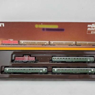 #322 â€¢ Marklin Mini-Club Z Scale 4 Piece Train Set - 81414
Locamotive, 3 passenger cars # 81414