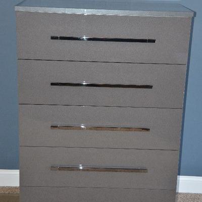 Item #5 Tall Dresser 
(Part of matching bedroom set) 
Beautiful Gloss Gray! Very trendy and stylish. Has 