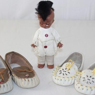 Vintage Infant Leather Beaded Indian Moccasins Shown with a Vintage Hard Plastic â€œMohawkâ€ 6â€ Indian Doll
