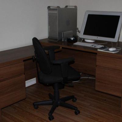 Laminated Oak â€œLâ€ Shape Desk with Small Upper & Lower File Drawers.  Shown with Apple Computer: Tower, Monitor, Keyboard and Mouse....