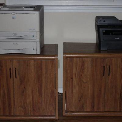 Oak finish 2-Door Cabinets Shown with:  HP Laser Jet 5100tn Printer w/Q1866A 500 Sheet Paper Feeder and Brother DCP-7060D Multi Function...
