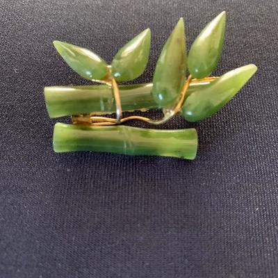 Jade, gold filled brooch
