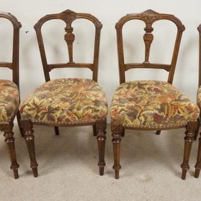1039	SET OF FOUR CARVED WALNUT VICTORIAN CHAIRS W/ UPHOLSTERED SEATS 
