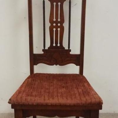 1030	CARVED HIGH BACK CHAIR WITH CARVED FACE ON THE SPLAT, HAS A SLIP SEAT CUSHION
