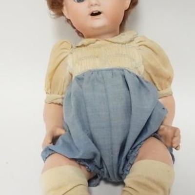 1084	BISQUE HEAD DOLL MARKED M RE NIPPON. 14 1/2 IN H
