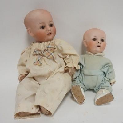 1093	TWO NIPPON BISQUE HEAD DOLLS, TALLEST IS 13 IN H 
