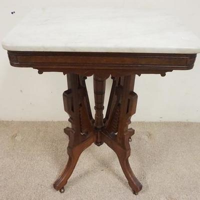1038	CARVED WALNUT VICTORIAN MARBLE TOP TABLE 

