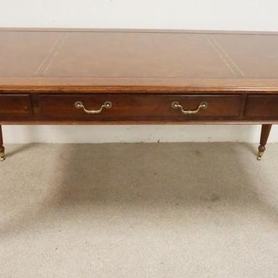 1067	ETHAN ALLEN THREE DRAWER LEATHER TOP DESK, FLUTED LEGS HAVE GOLD TRIM 
