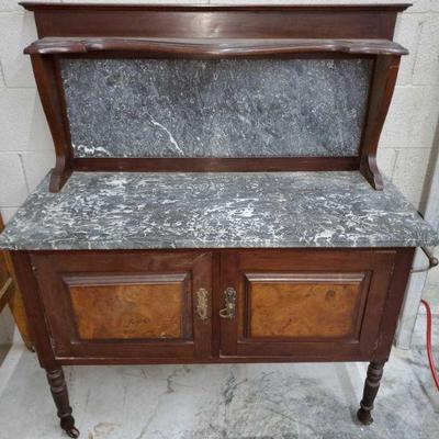 2012: Antique Marble Topped Buffet
Buffet measures approx. 18