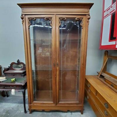 2010: Antique 7' tall cabinet w/ Glass doors and Shelves
Cabinet measures approx. 51