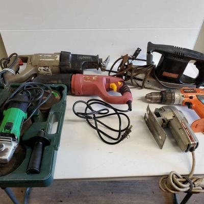 8058: Drill, Saws and Angle Grinder Power Tool Lot
Craftsman recipro saw and two others, Rigid drill, Shop Craft jig saw, Hitachi Angle...