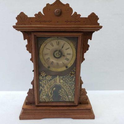 2132:Antique Seth Thomas Wood Clock
Measures Approx. 4.5