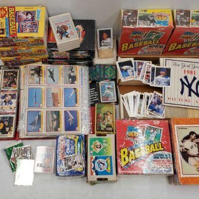 3780: Huge lot of Sports Trading Cards
Includes a huge amount of trading cards for sports including Baseball, Football, and Hockey. Also...
