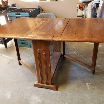 2021-Antique Folding Wood Dining Table
Wood on one side of table is separated from hinging piece (Put together for picture purposes)....
