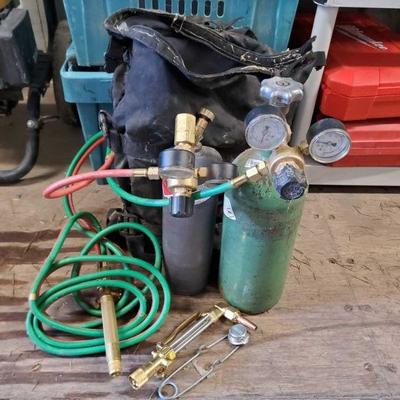 8005: Oxygen & Acetylene Tanks w/ Valves, Guages & Welding Torch
Oxygen & Acetylene Tanks w/ Valves, Guages & Welding Torch