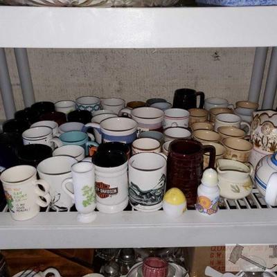 9043: Large Lot of Coffee Mugs, Tea pot & Other Dishes
Large Lot of Coffee Mugs from brands such as Harley-Davidson and decor brands, Tea...