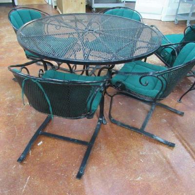 Iron patio table and four chairs