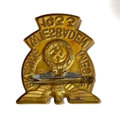 A 1933 WIESBADEN NATIONAL SOCIALIST EXHIBITION BADGE
A 1933 Wiesbaden Braune Messe badge, in bronze with horizontal pinback, unmarked,...